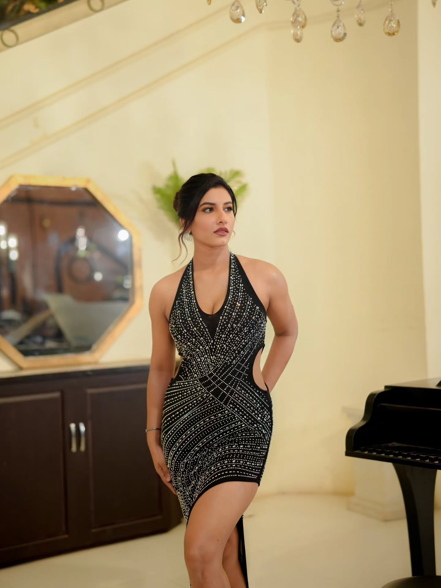A Black Dress That Blends Glamour With Modern Sophistication
