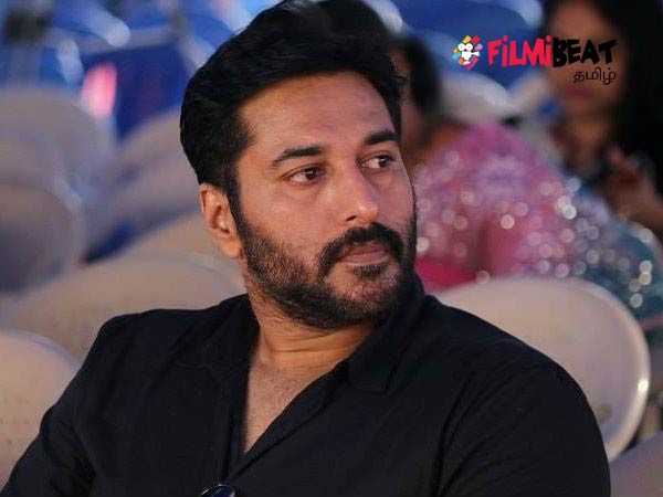 Guess the person in the photo