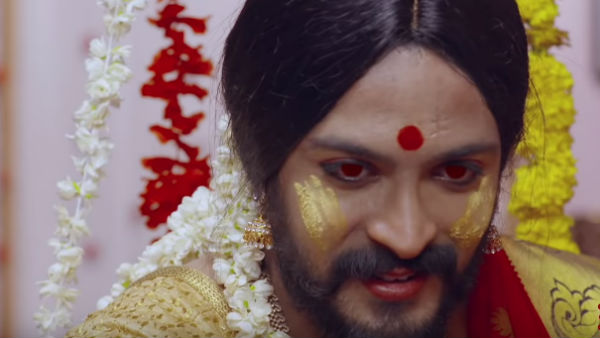 நெற்றியில் பெரிய பொட்டு 