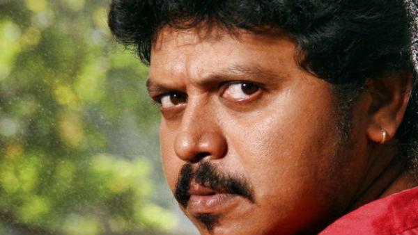 choreographer sridhar with many celebrities on stage. 