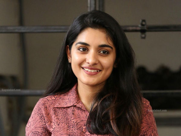 தமிழில்