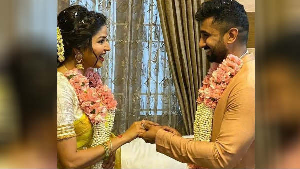 Nithya ram kissing with her husband Nithya ram kissing with her husband