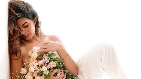 பூக்களால் மறைத்து பூக்களால் மறைத்து