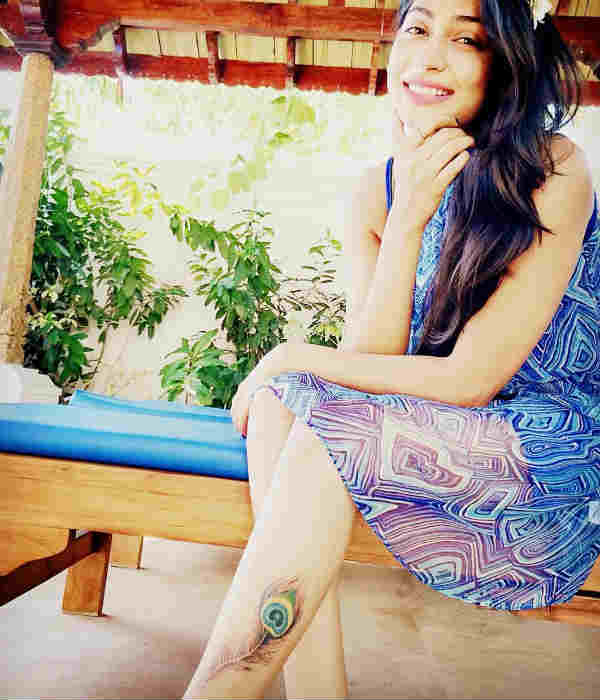 மயிலிறகு பச்சை குத்தி 