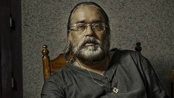 தமிழில் அசோகன் 