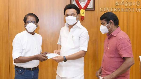 ரூ 5 லட்சம் காசோலை ரூ 5 லட்சம் காசோலை