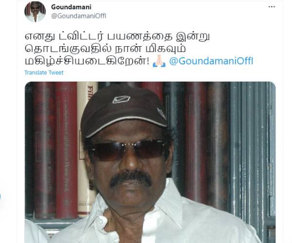 வெள்ளை சட்டை கறுப்பு கண்ணாடி
