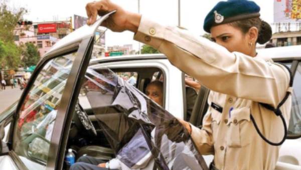 jr ntr vehicle stopped by traffic cops in Hyderabad for having tinted windows