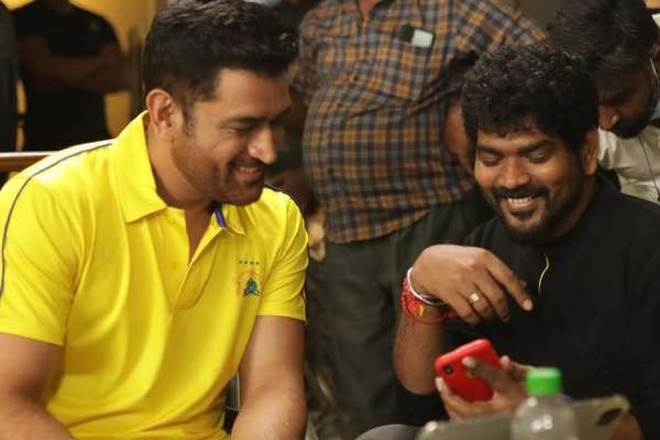 தோனியுடன்