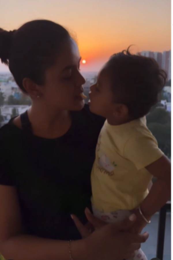 Chaitra Reddy gets trolled for giving food to a kid with her mouth Chaitra Reddy gets trolled for giving food to a kid with her mouth