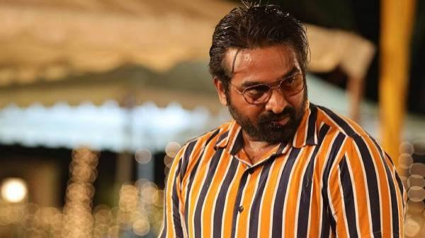 Lawrence is the first choice to play santhanam character in vikram movie 