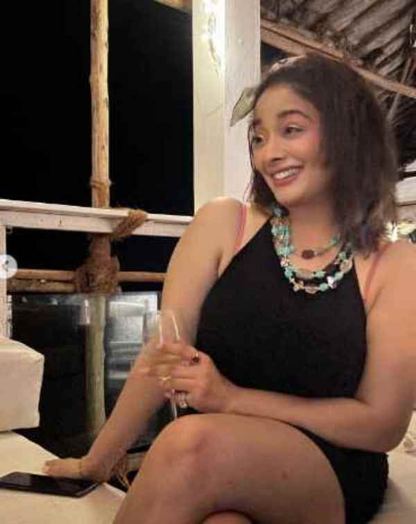 Actress Kiran shares her wine drinking hot photos 
