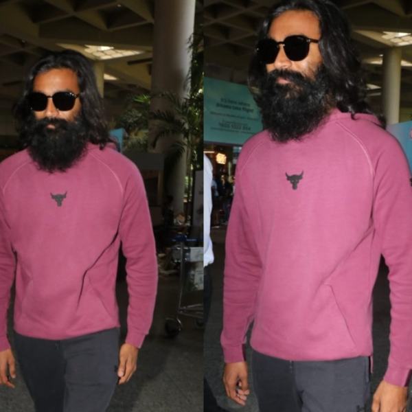 Actor Dhanush spotted in Mumbai airport with Captain miller look 