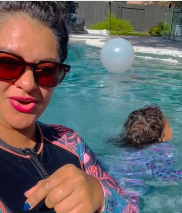 Vishwaroopam actress Pooja Kumar playing in swimming pool with her daughter video trending
