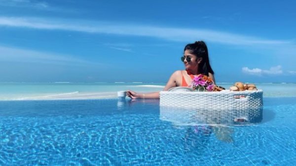 Megha Akash enjoys her holidays at Maldives and shares a swim wear photo