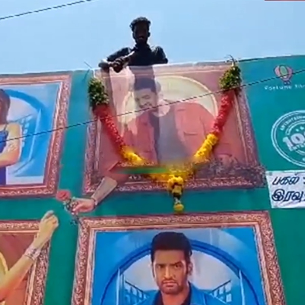 Beer abhishekam for Santhanam banner in Puducherry Beer abhishekam for Santhanam banner in Puducherry
