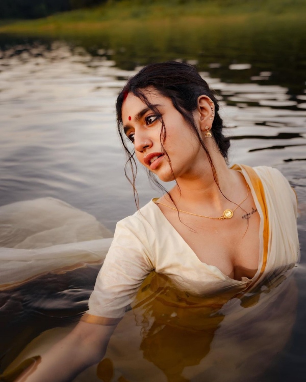 actress priya varrier underwater photos trending on social media 