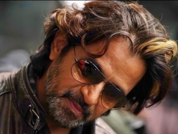 Actor Arjuns look in Vidaamuyarchi revealed and the photo said to be took by Ajithkumar