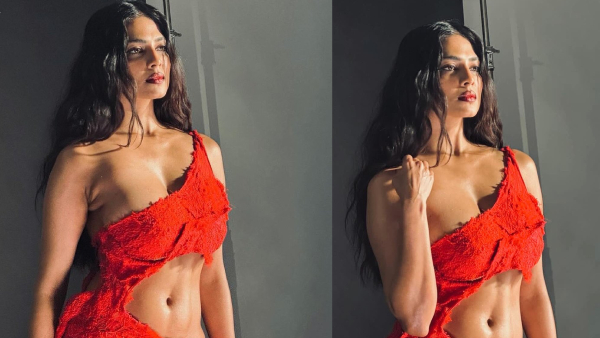 Malavika Mohanan stunning orange outfit latest pics trending in social media Malavika Mohanan stunning orange outfit latest pics trending in social media
