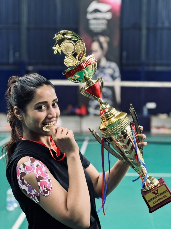 Nivetha Pethuraj won shield and trophy at Badminton game photos trending