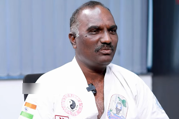 Suriya Son Dev is a very disciplined student told by Karate Master Balamurugan