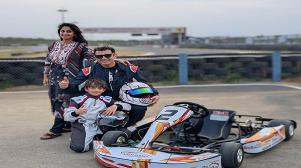 Photos of Ajith and his son Aadvik in a race car are trending