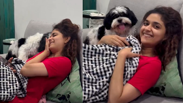 Acterss Keerthi Suresh Play With Her Pet Dog Watch Video