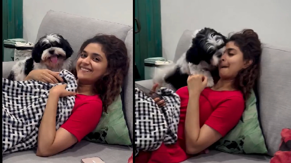 Acterss Keerthi Suresh Play With Her Pet Dog Watch Video