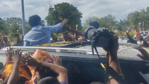 Actor Dhanush Went Madurai His Fans Gives Special Welcome And Present Murugar Vel