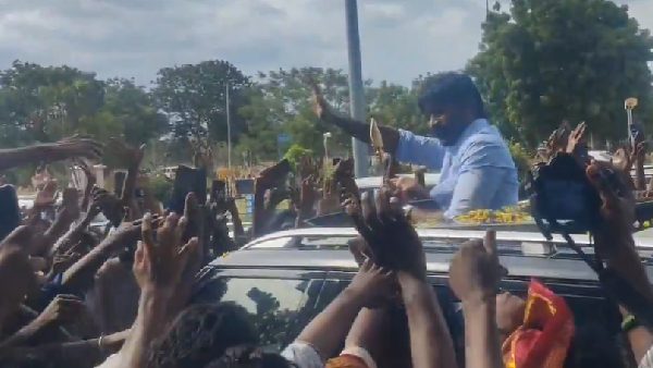 Actor Dhanush Went Madurai His Fans Gives Special Welcome And Present Murugar Vel