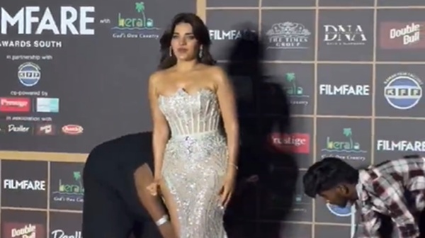 Nidhhi Agerwal Trolled Online After Assistant Holds Her Dress at Filmfare Awards South in Kochi