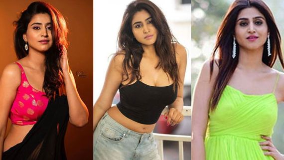 యాంకర్ వర్షిణి ఓవర్ డోస్ హాట్ షో: ముందుకు వంగి మరీ ఎద అందాల ప్రదర్శన