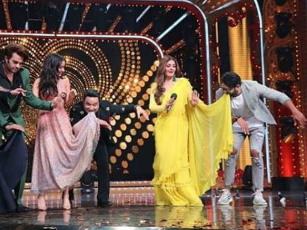 చీర కొంగును పట్టుకున్నాడు