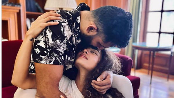 భర్త ముద్దుతో పరవశం..