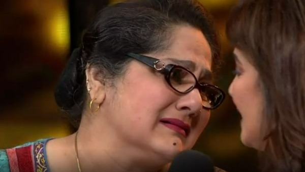 పొంగుకొచ్చిన దు:ఖాన్ని ఆపుకొంటూ