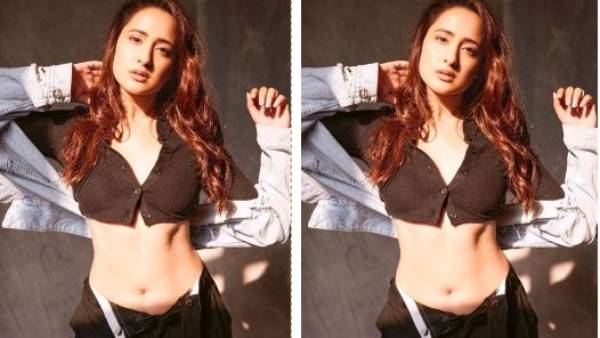 బటన్స్ మొత్తం తీసేసిన హీరోయిన్