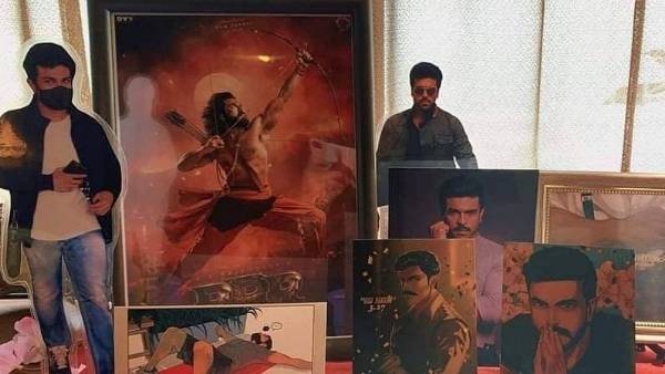 రాంచరణ్ సినిమా పోస్టర్లతో