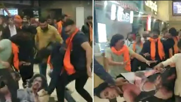 పోస్టర్లు చించేసి కాళ్లతో తొక్కి