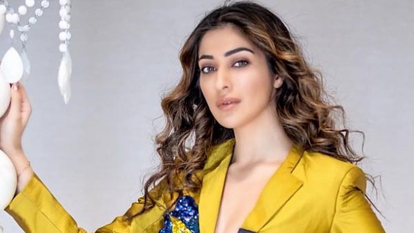 Raai Laxmi Sizzling Hot Pose In Latest Black Color Bikini At Beach