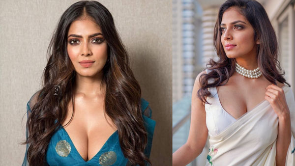 Malavika Mohanan Ravishing Look In Latest White Colour Sleeveless Blouse 