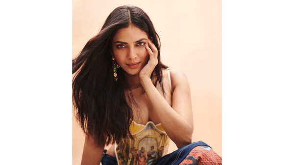 Malavika Mohanan Sizzling Look In Latest Yellow Colour Sleeveless Top