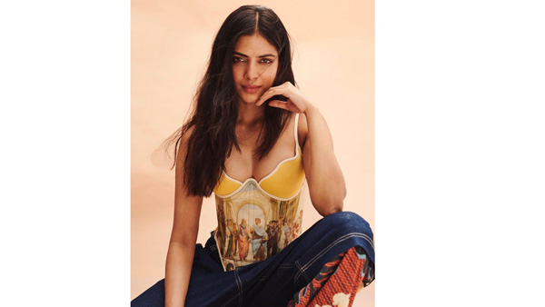 Malavika Mohanan Sizzling Look In Latest Yellow Colour Sleeveless Top