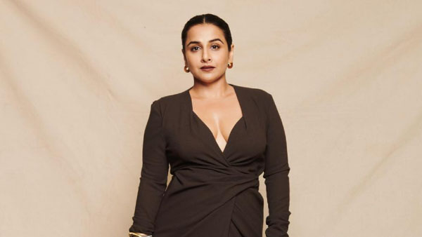 Seniors actress Vidya balan latest glamorous photos in red saree