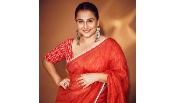 Seniors actress Vidya balan latest glamorous photos in red saree