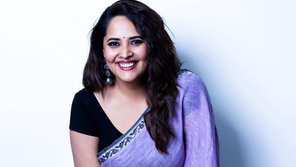 Anchor Anasuya Bharadwaj Exposing In Blue Short With Husband At Beach