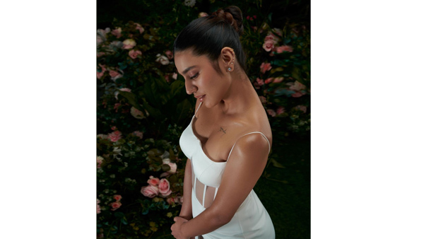 Priya Prakash Varrier Sizzling Looks In Latest White Bodycon Dress