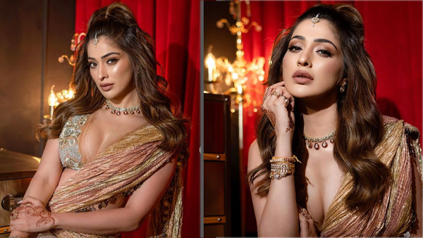 Raai Laxmi Sizzling Looks In Latest Red Colour Swimsuit In Swimming Pool