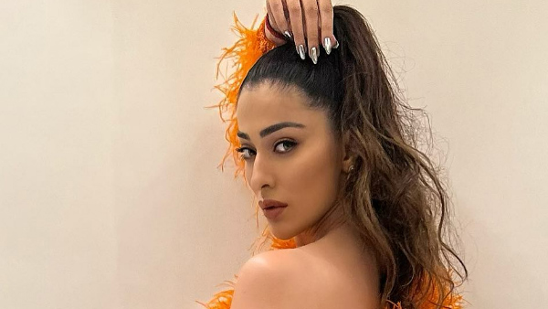 Raai Laxmi Sizzling Looks In Latest Red Colour Swimsuit In Swimming Pool