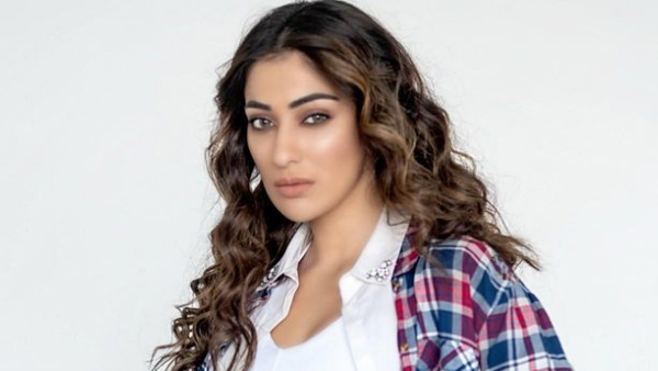 Raai Laxmi Sizzling Looks In Latest Red Colour Swimsuit In Swimming Pool