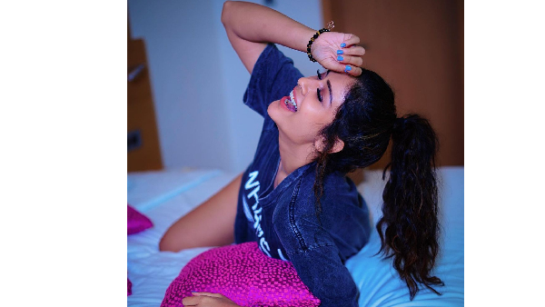 Payal Rajput Stunning Hot Look In Latest Blue Shirt On Bed
